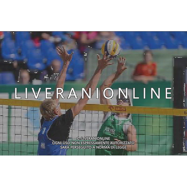 21.08.2014 - Stare Jablonki , siatkowka plazowa , beach volleyball , World Tour , FIVB Stare Jablonki Grand Slam 2014 , Polska (zielone) - Rosja (niebieskie) , Poland - Russia N/Z Dmitri Barsouk , Grzegorz Fijalek Fot. Mariusz Palczynski / MPAimages.com/NEWSPIX.PL --- Newspix.pl /Agenzia Aldo Liverani sas - ITALY ONLY - Polonia - Russia beach volley maschile, World Tour, FIVB Stare Jablonki Grande Slam 2014 *** Local Caption *** www.newspix.pl mail us: info@newspix.pl call us: 0048 022 23 22 222 --- Polish Picture Agency by Ringier Axel Springer Poland