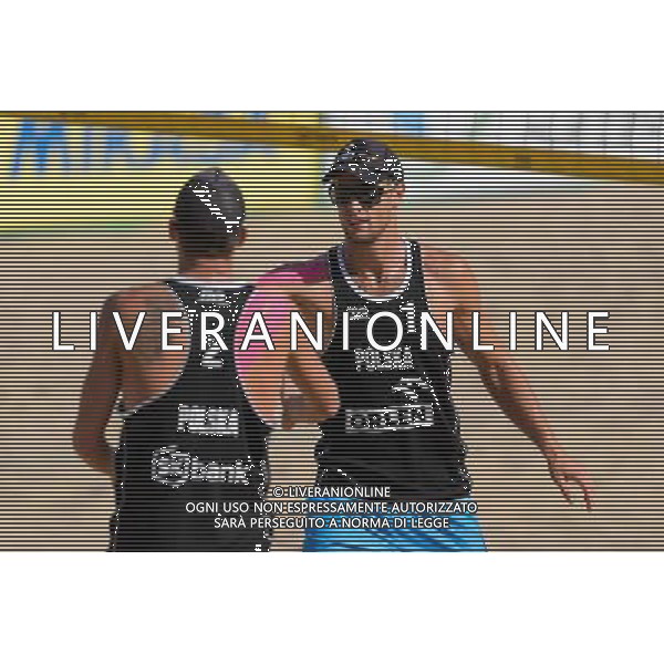 21.08.2014 - Stare Jablonki , siatkowka plazowa , beach volleyball , World Tour , FIVB Stare Jablonki Grand Slam 2014 , Polska (czarne) - Niemcy (zolte) , Poland - Germany N/Z Jakub Szalankiewicz , Michal Kadziola Fot. Mariusz Palczynski / MPAimages.com/NEWSPIX.PL --- Newspix.pl /Agenzia Aldo Liverani sas - ITALY ONLY - Polonia - Germania beach volley maschile, World Tour, FIVB Stare Jablonki Grande Slam 2014 *** Local Caption *** www.newspix.pl mail us: info@newspix.pl call us: 0048 022 23 22 222 --- Polish Picture Agency by Ringier Axel Springer Poland