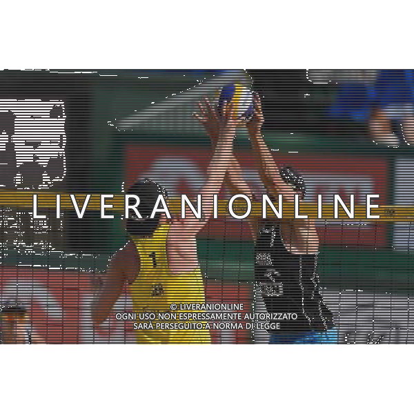 21.08.2014 - Stare Jablonki , siatkowka plazowa , beach volleyball , World Tour , FIVB Stare Jablonki Grand Slam 2014 , Polska (czarne) - Niemcy (zolte) , Poland - Germany N/Z Thomas Kaczmarek , Michal Kadziola Fot. Mariusz Palczynski / MPAimages.com/NEWSPIX.PL --- Newspix.pl /Agenzia Aldo Liverani sas - ITALY ONLY - Polonia - Germania beach volley maschile, World Tour, FIVB Stare Jablonki Grande Slam 2014 *** Local Caption *** www.newspix.pl mail us: info@newspix.pl call us: 0048 022 23 22 222 --- Polish Picture Agency by Ringier Axel Springer Poland