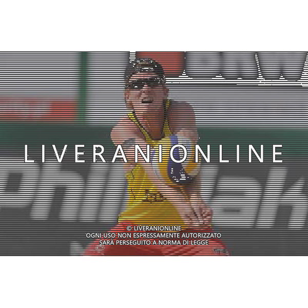 21.08.2014 - Stare Jablonki , siatkowka plazowa , beach volleyball , World Tour , FIVB Stare Jablonki Grand Slam 2014 , Polska (czarne) - Niemcy (zolte) , Poland - Germany N/Z Thomas Kaczmarek Fot. Mariusz Palczynski / MPAimages.com/NEWSPIX.PL --- Newspix.pl /Agenzia Aldo Liverani sas - ITALY ONLY - Polonia - Germania beach volley maschile, World Tour, FIVB Stare Jablonki Grande Slam 2014 *** Local Caption *** www.newspix.pl mail us: info@newspix.pl call us: 0048 022 23 22 222 --- Polish Picture Agency by Ringier Axel Springer Poland