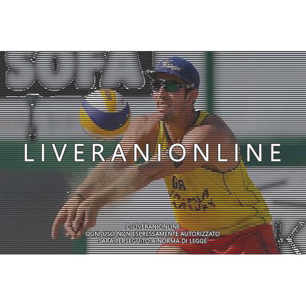21.08.2014 - Stare Jablonki , siatkowka plazowa , beach volleyball , World Tour , FIVB Stare Jablonki Grand Slam 2014 , Polska (czarne) - Niemcy (zolte) , Poland - Germany N/Z Sebastian Fuchs Fot. Mariusz Palczynski / MPAimages.com/NEWSPIX.PL --- Newspix.pl /Agenzia Aldo Liverani sas - ITALY ONLY - Polonia - Germania beach volley maschile, World Tour, FIVB Stare Jablonki Grande Slam 2014 *** Local Caption *** www.newspix.pl mail us: info@newspix.pl call us: 0048 022 23 22 222 --- Polish Picture Agency by Ringier Axel Springer Poland