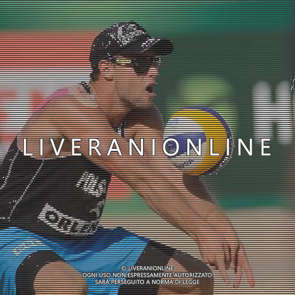 21.08.2014 - Stare Jablonki , siatkowka plazowa , beach volleyball , World Tour , FIVB Stare Jablonki Grand Slam 2014 , Polska (czarne) - Niemcy (zolte) , Poland - Germany N/Z Michal Kadziola Fot. Mariusz Palczynski / MPAimages.com/NEWSPIX.PL --- Newspix.pl /Agenzia Aldo Liverani sas - ITALY ONLY - Polonia - Germania beach volley maschile, World Tour, FIVB Stare Jablonki Grande Slam 2014 *** Local Caption *** www.newspix.pl mail us: info@newspix.pl call us: 0048 022 23 22 222 --- Polish Picture Agency by Ringier Axel Springer Poland