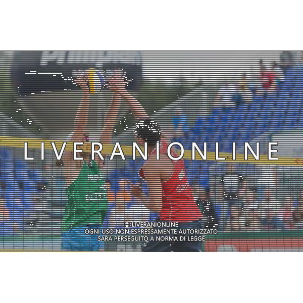 22.08.2014 - Stare Jablonki , siatkowka plazowa , beach volleyball , World Tour , FIVB Stare Jablonki Grand Slam 2014 , Polska (zielone) - Brazilia (czerwone) , Poland - Brazil N/Z Mariusz Prudel , Vitor Goncalves Felipe Fot. Mariusz Palczynski / MPAimages.com/NEWSPIX.PL --- Newspix.pl /Agenzia Aldo Liverani sas - ITALY ONLY - Polonia - Brasile beach volley maschile, World Tour, FIVB Stare Jablonki Grande Slam 2014 *** Local Caption *** www.newspix.pl mail us: info@newspix.pl call us: 0048 022 23 22 222 --- Polish Picture Agency by Ringier Axel Springer Poland