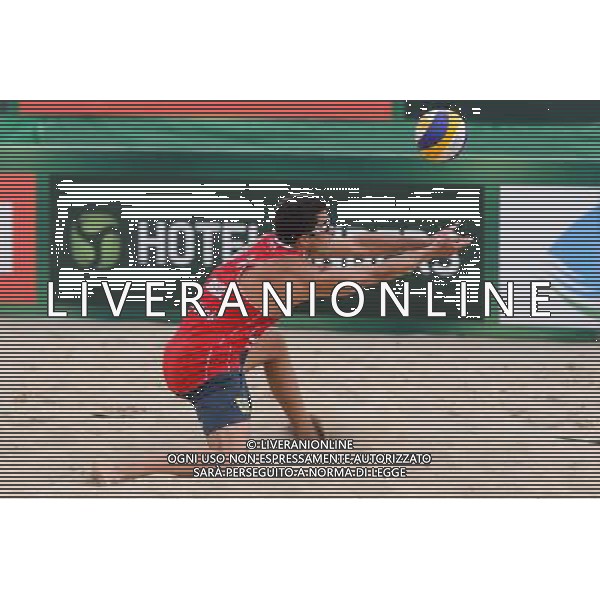 22.08.2014 - Stare Jablonki , siatkowka plazowa , beach volleyball , World Tour , FIVB Stare Jablonki Grand Slam 2014 , Polska (zielone) - Brazilia (czerwone) , Poland - Brazil N/Z Vitor Goncalves Felipe Fot. Mariusz Palczynski / MPAimages.com/NEWSPIX.PL --- Newspix.pl /Agenzia Aldo Liverani sas - ITALY ONLY - Polonia - Brasile beach volley maschile, World Tour, FIVB Stare Jablonki Grande Slam 2014 *** Local Caption *** www.newspix.pl mail us: info@newspix.pl call us: 0048 022 23 22 222 --- Polish Picture Agency by Ringier Axel Springer Poland