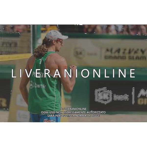 22.08.2014 - Stare Jablonki , siatkowka plazowa , beach volleyball , World Tour , FIVB Stare Jablonki Grand Slam 2014 , Polska (zielone) - Brazilia (czerwone) , Poland - Brazil N/Z Mariusz Prudel Fot. Mariusz Palczynski / MPAimages.com/NEWSPIX.PL --- Newspix.pl /Agenzia Aldo Liverani sas - ITALY ONLY - Polonia - Brasile beach volley maschile, World Tour, FIVB Stare Jablonki Grande Slam 2014 *** Local Caption *** www.newspix.pl mail us: info@newspix.pl call us: 0048 022 23 22 222 --- Polish Picture Agency by Ringier Axel Springer Poland