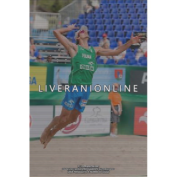 22.08.2014 - Stare Jablonki , siatkowka plazowa , beach volleyball , World Tour , FIVB Stare Jablonki Grand Slam 2014 , Polska (zielone) - Brazilia (czerwone) , Poland - Brazil N/Z Mariusz Prudel Fot. Mariusz Palczynski / MPAimages.com/NEWSPIX.PL --- Newspix.pl /Agenzia Aldo Liverani sas - ITALY ONLY - Polonia - Brasile beach volley maschile, World Tour, FIVB Stare Jablonki Grande Slam 2014 *** Local Caption *** www.newspix.pl mail us: info@newspix.pl call us: 0048 022 23 22 222 --- Polish Picture Agency by Ringier Axel Springer Poland
