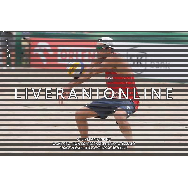 22.08.2014 - Stare Jablonki , siatkowka plazowa , beach volleyball , World Tour , FIVB Stare Jablonki Grand Slam 2014 , Polska (zielone) - Brazilia (czerwone) , Poland - Brazil N/Z Fot. Mariusz Palczynski / MPAimages.com/NEWSPIX.PL --- Newspix.pl /Agenzia Aldo Liverani sas - ITALY ONLY - Polonia - Brasile beach volley maschile, World Tour, FIVB Stare Jablonki Grande Slam 2014 *** Local Caption *** www.newspix.pl mail us: info@newspix.pl call us: 0048 022 23 22 222 --- Polish Picture Agency by Ringier Axel Springer Poland