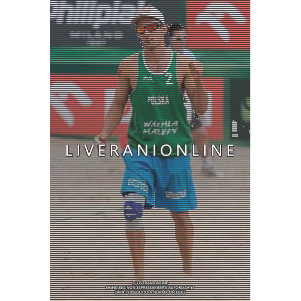 22.08.2014 - Stare Jablonki , siatkowka plazowa , beach volleyball , World Tour , FIVB Stare Jablonki Grand Slam 2014 , Polska (zielone) - Brazilia (czerwone) , Poland - Brazil N/Z Grzegorz Fijalek Fot. Mariusz Palczynski / MPAimages.com/NEWSPIX.PL --- Newspix.pl /Agenzia Aldo Liverani sas - ITALY ONLY - Polonia - Brasile beach volley maschile, World Tour, FIVB Stare Jablonki Grande Slam 2014 *** Local Caption *** www.newspix.pl mail us: info@newspix.pl call us: 0048 022 23 22 222 --- Polish Picture Agency by Ringier Axel Springer Poland
