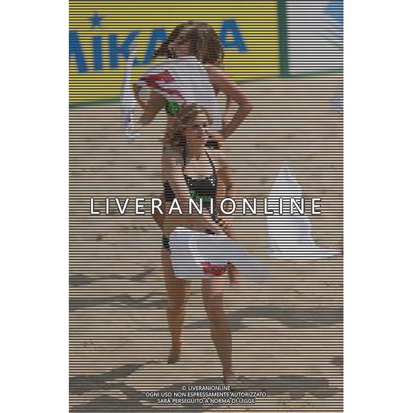 22.08.2014 - Stare Jablonki , siatkowka plazowa , beach volleyball , World Tour , FIVB Stare Jablonki Grand Slam 2014 , Polska (zielone) - Brazilia (czerwone) , Poland - Brazil N/Z Cheerleaders Flex Sopot Fot. Mariusz Palczynski / MPAimages.com/NEWSPIX.PL --- Newspix.pl /Agenzia Aldo Liverani sas - ITALY ONLY - Polonia - Brasile beach volley maschile, World Tour, FIVB Stare Jablonki Grande Slam 2014 *** Local Caption *** www.newspix.pl mail us: info@newspix.pl call us: 0048 022 23 22 222 --- Polish Picture Agency by Ringier Axel Springer Poland