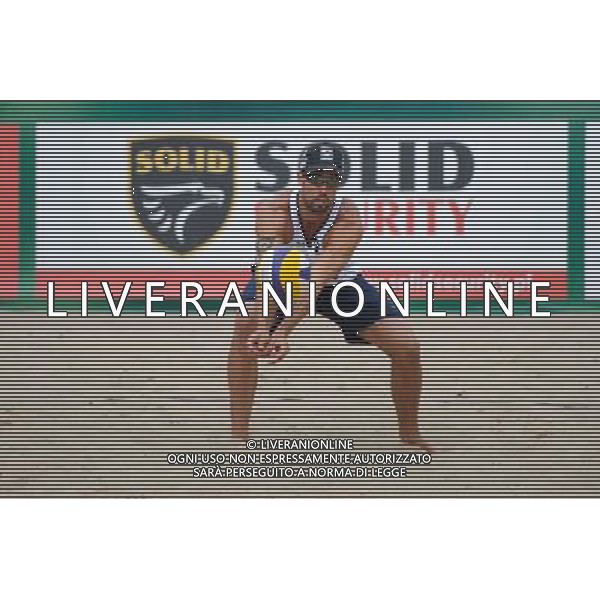 22.08.2014 - Stare Jablonki , siatkowka plazowa , beach volleyball , World Tour , FIVB Stare Jablonki Grand Slam 2014 , Hiszpania (biale) - Rosja (czerwone) , Spain (white) - Russia (red) N/Z Adrian Gavira Collado Fot. Karol Bartnik / MPAimages.com/NEWSPIX.PL --- Newspix.pl /Agenzia Aldo Liverani sas - ITALY ONLY - Spagna - Russia beach volley maschile, World Tour, FIVB Stare Jablonki Grande Slam 2014 *** Local Caption *** www.newspix.pl mail us: info@newspix.pl call us: 0048 022 23 22 222 --- Polish Picture Agency by Ringier Axel Springer Poland