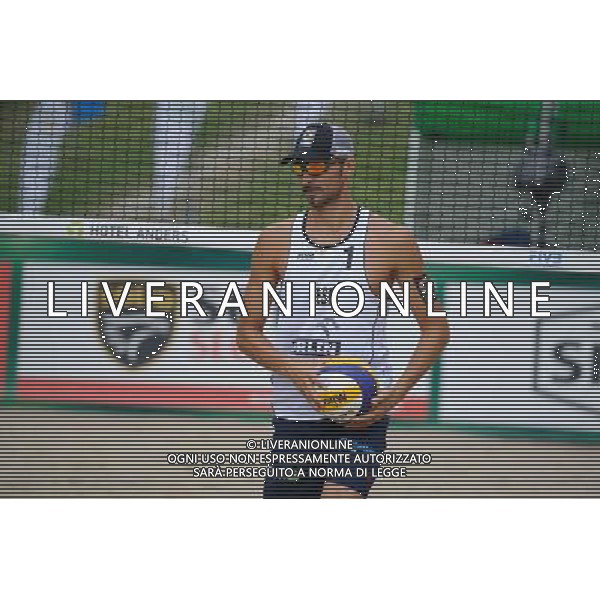 22.08.2014 - Stare Jablonki , siatkowka plazowa , beach volleyball , World Tour , FIVB Stare Jablonki Grand Slam 2014 , Hiszpania (biale) - Rosja (czerwone) , Spain (white) - Russia (red) N/Z Pablo Herrera Allepuz Fot. Karol Bartnik / MPAimages.com/NEWSPIX.PL --- Newspix.pl /Agenzia Aldo Liverani sas - ITALY ONLY - Spagna - Russia beach volley maschile, World Tour, FIVB Stare Jablonki Grande Slam 2014 *** Local Caption *** www.newspix.pl mail us: info@newspix.pl call us: 0048 022 23 22 222 --- Polish Picture Agency by Ringier Axel Springer Poland