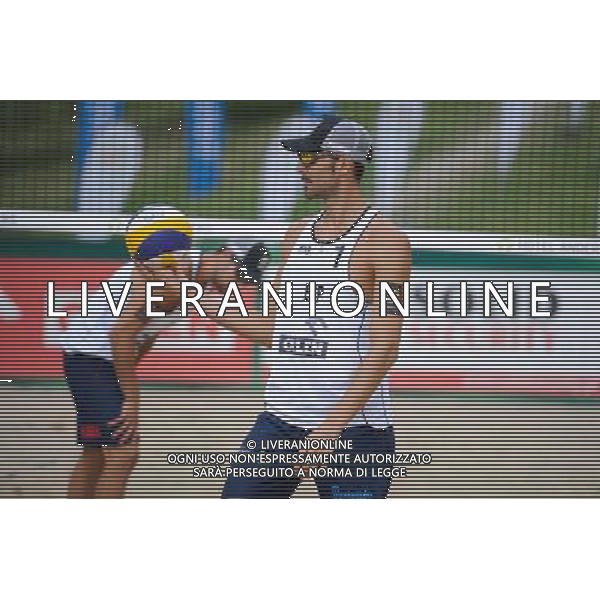 22.08.2014 - Stare Jablonki , siatkowka plazowa , beach volleyball , World Tour , FIVB Stare Jablonki Grand Slam 2014 , Hiszpania (biale) - Rosja (czerwone) , Spain (white) - Russia (red) N/Z Pablo Herrera Allepuz Fot. Karol Bartnik / MPAimages.com/NEWSPIX.PL --- Newspix.pl /Agenzia Aldo Liverani sas - ITALY ONLY - Spagna - Russia beach volley maschile, World Tour, FIVB Stare Jablonki Grande Slam 2014 *** Local Caption *** www.newspix.pl mail us: info@newspix.pl call us: 0048 022 23 22 222 --- Polish Picture Agency by Ringier Axel Springer Poland