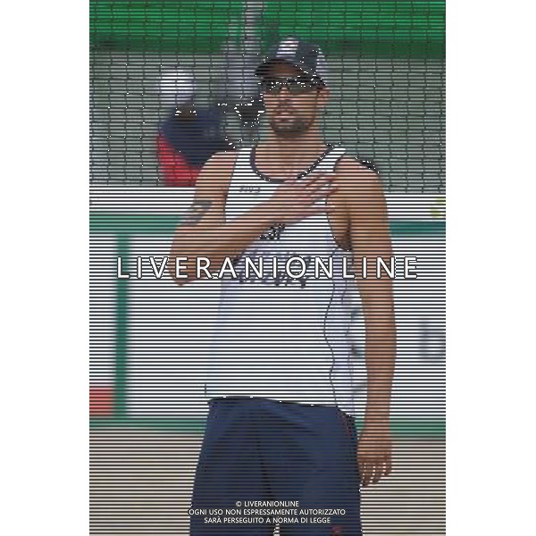 22.08.2014 - Stare Jablonki , siatkowka plazowa , beach volleyball , World Tour , FIVB Stare Jablonki Grand Slam 2014 , Hiszpania (biale) - Rosja (czerwone) , Spain (white) - Russia (red) N/Z Adrian Gavira Collado Fot. Karol Bartnik / MPAimages.com/NEWSPIX.PL --- Newspix.pl /Agenzia Aldo Liverani sas - ITALY ONLY - Spagna - Russia beach volley maschile, World Tour, FIVB Stare Jablonki Grande Slam 2014 *** Local Caption *** www.newspix.pl mail us: info@newspix.pl call us: 0048 022 23 22 222 --- Polish Picture Agency by Ringier Axel Springer Poland