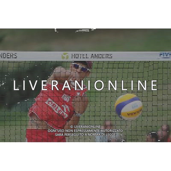 22.08.2014 - Stare Jablonki , siatkowka plazowa , beach volleyball , World Tour , FIVB Stare Jablonki Grand Slam 2014 , Hiszpania (biale) - Rosja (czerwone) , Spain (white) - Russia (red) N/Z Konstantin Semenov Fot. Karol Bartnik / MPAimages.com/NEWSPIX.PL --- Newspix.pl /Agenzia Aldo Liverani sas - ITALY ONLY - Spagna - Russia beach volley maschile, World Tour, FIVB Stare Jablonki Grande Slam 2014 *** Local Caption *** www.newspix.pl mail us: info@newspix.pl call us: 0048 022 23 22 222 --- Polish Picture Agency by Ringier Axel Springer Poland