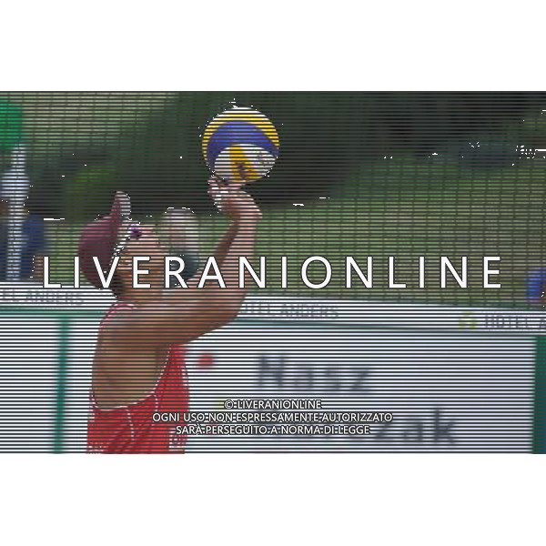 22.08.2014 - Stare Jablonki , siatkowka plazowa , beach volleyball , World Tour , FIVB Stare Jablonki Grand Slam 2014 , Hiszpania (biale) - Rosja (czerwone) , Spain (white) - Russia (red) N/Z Konstantin Semenov Fot. Karol Bartnik / MPAimages.com/NEWSPIX.PL --- Newspix.pl /Agenzia Aldo Liverani sas - ITALY ONLY - Spagna - Russia beach volley maschile, World Tour, FIVB Stare Jablonki Grande Slam 2014 *** Local Caption *** www.newspix.pl mail us: info@newspix.pl call us: 0048 022 23 22 222 --- Polish Picture Agency by Ringier Axel Springer Poland