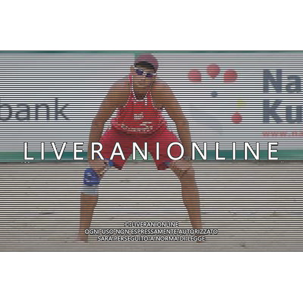 22.08.2014 - Stare Jablonki , siatkowka plazowa , beach volleyball , World Tour , FIVB Stare Jablonki Grand Slam 2014 , Hiszpania (biale) - Rosja (czerwone) , Spain (white) - Russia (red) N/Z Konstantin Semenov Fot. Karol Bartnik / MPAimages.com/NEWSPIX.PL --- Newspix.pl /Agenzia Aldo Liverani sas - ITALY ONLY - Spagna - Russia beach volley maschile, World Tour, FIVB Stare Jablonki Grande Slam 2014 *** Local Caption *** www.newspix.pl mail us: info@newspix.pl call us: 0048 022 23 22 222 --- Polish Picture Agency by Ringier Axel Springer Poland