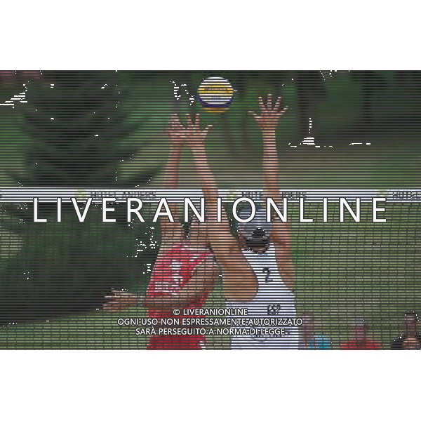 22.08.2014 - Stare Jablonki , siatkowka plazowa , beach volleyball , World Tour , FIVB Stare Jablonki Grand Slam 2014 , Hiszpania (biale) - Rosja (czerwone) , Spain (white) - Russia (red) N/Z Konstantin Semenov , Adrian Gavira Collado Fot. Karol Bartnik / MPAimages.com/NEWSPIX.PL --- Newspix.pl /Agenzia Aldo Liverani sas - ITALY ONLY - Spagna - Russia beach volley maschile, World Tour, FIVB Stare Jablonki Grande Slam 2014 *** Local Caption *** www.newspix.pl mail us: info@newspix.pl call us: 0048 022 23 22 222 --- Polish Picture Agency by Ringier Axel Springer Poland