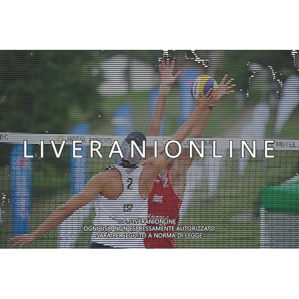 22.08.2014 - Stare Jablonki , siatkowka plazowa , beach volleyball , World Tour , FIVB Stare Jablonki Grand Slam 2014 , Hiszpania (biale) - Rosja (czerwone) , Spain (white) - Russia (red) N/Z Adrian Gavira Collado , Viacheslav Krasilnikov Fot. Karol Bartnik / MPAimages.com/NEWSPIX.PL --- Newspix.pl /Agenzia Aldo Liverani sas - ITALY ONLY - Spagna - Russia beach volley maschile, World Tour, FIVB Stare Jablonki Grande Slam 2014 *** Local Caption *** www.newspix.pl mail us: info@newspix.pl call us: 0048 022 23 22 222 --- Polish Picture Agency by Ringier Axel Springer Poland