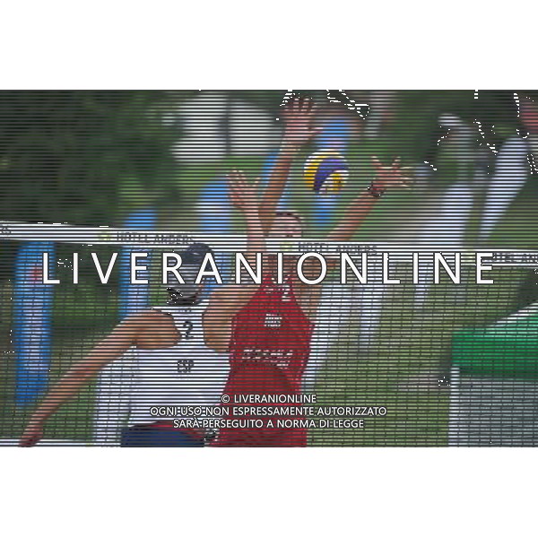 22.08.2014 - Stare Jablonki , siatkowka plazowa , beach volleyball , World Tour , FIVB Stare Jablonki Grand Slam 2014 , Hiszpania (biale) - Rosja (czerwone) , Spain (white) - Russia (red) N/Z Adrian Gavira Collado , Viacheslav Krasilnikov Fot. Karol Bartnik / MPAimages.com/NEWSPIX.PL --- Newspix.pl /Agenzia Aldo Liverani sas - ITALY ONLY - Spagna - Russia beach volley maschile, World Tour, FIVB Stare Jablonki Grande Slam 2014 *** Local Caption *** www.newspix.pl mail us: info@newspix.pl call us: 0048 022 23 22 222 --- Polish Picture Agency by Ringier Axel Springer Poland