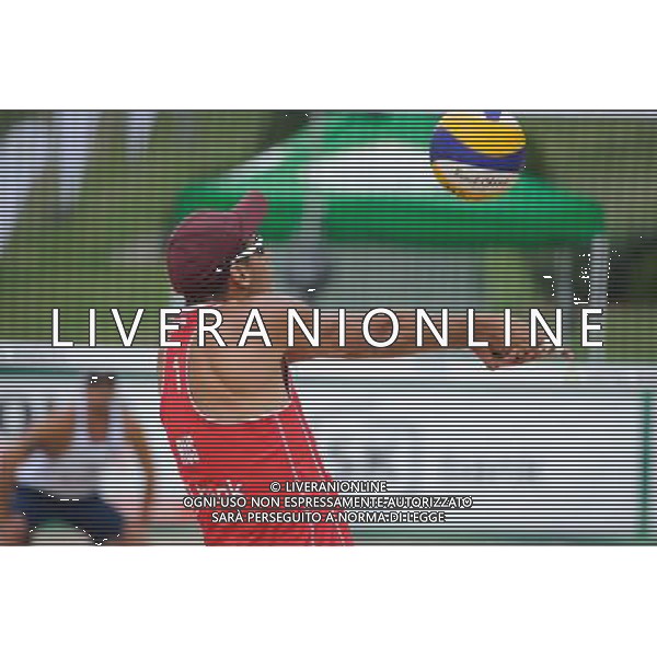 22.08.2014 - Stare Jablonki , siatkowka plazowa , beach volleyball , World Tour , FIVB Stare Jablonki Grand Slam 2014 , Hiszpania (biale) - Rosja (czerwone) , Spain (white) - Russia (red) N/Z Konstantin Semenov Fot. Karol Bartnik / MPAimages.com/NEWSPIX.PL --- Newspix.pl /Agenzia Aldo Liverani sas - ITALY ONLY - Spagna - Russia beach volley maschile, World Tour, FIVB Stare Jablonki Grande Slam 2014 *** Local Caption *** www.newspix.pl mail us: info@newspix.pl call us: 0048 022 23 22 222 --- Polish Picture Agency by Ringier Axel Springer Poland