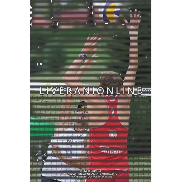 22.08.2014 - Stare Jablonki , siatkowka plazowa , beach volleyball , World Tour , FIVB Stare Jablonki Grand Slam 2014 , Hiszpania (biale) - Rosja (czerwone) , Spain (white) - Russia (red) N/Z Pablo Herrera Allepuz , Viacheslav Krasilnikov Fot. Karol Bartnik / MPAimages.com/NEWSPIX.PL --- Newspix.pl /Agenzia Aldo Liverani sas - ITALY ONLY - Spagna - Russia beach volley maschile, World Tour, FIVB Stare Jablonki Grande Slam 2014 *** Local Caption *** www.newspix.pl mail us: info@newspix.pl call us: 0048 022 23 22 222 --- Polish Picture Agency by Ringier Axel Springer Poland