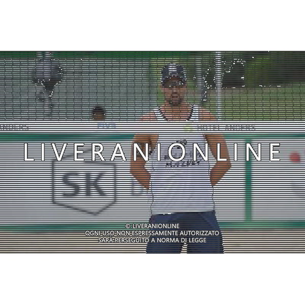 22.08.2014 - Stare Jablonki , siatkowka plazowa , beach volleyball , World Tour , FIVB Stare Jablonki Grand Slam 2014 , Hiszpania (biale) - Rosja (czerwone) , Spain (white) - Russia (red) N/Z Adrian Gavira Collado Fot. Karol Bartnik / MPAimages.com/NEWSPIX.PL --- Newspix.pl /Agenzia Aldo Liverani sas - ITALY ONLY - Spagna - Russia beach volley maschile, World Tour, FIVB Stare Jablonki Grande Slam 2014 *** Local Caption *** www.newspix.pl mail us: info@newspix.pl call us: 0048 022 23 22 222 --- Polish Picture Agency by Ringier Axel Springer Poland