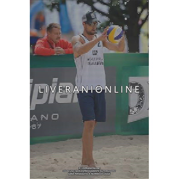 22.08.2014 - Stare Jablonki , siatkowka plazowa , beach volleyball , World Tour , FIVB Stare Jablonki Grand Slam 2014 , Hiszpania (biale) - Rosja (czerwone) , Spain (white) - Russia (red) N/Z Adrian Gavira Collado Fot. Karol Bartnik / MPAimages.com/NEWSPIX.PL --- Newspix.pl /Agenzia Aldo Liverani sas - ITALY ONLY - Spagna - Russia beach volley maschile, World Tour, FIVB Stare Jablonki Grande Slam 2014 *** Local Caption *** www.newspix.pl mail us: info@newspix.pl call us: 0048 022 23 22 222 --- Polish Picture Agency by Ringier Axel Springer Poland