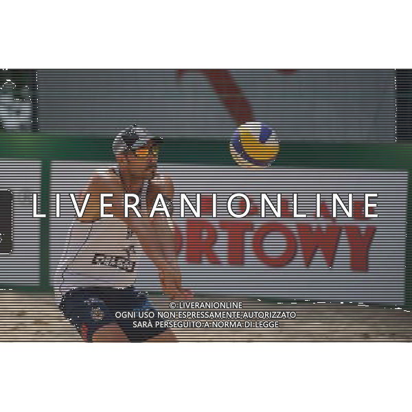 22.08.2014 - Stare Jablonki , siatkowka plazowa , beach volleyball , World Tour , FIVB Stare Jablonki Grand Slam 2014 , Hiszpania (biale) - Rosja (czerwone) , Spain (white) - Russia (red) N/Z Pablo Herrera Allepuz Fot. Karol Bartnik / MPAimages.com/NEWSPIX.PL --- Newspix.pl /Agenzia Aldo Liverani sas - ITALY ONLY - Spagna - Russia beach volley maschile, World Tour, FIVB Stare Jablonki Grande Slam 2014 *** Local Caption *** www.newspix.pl mail us: info@newspix.pl call us: 0048 022 23 22 222 --- Polish Picture Agency by Ringier Axel Springer Poland