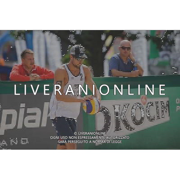 22.08.2014 - Stare Jablonki , siatkowka plazowa , beach volleyball , World Tour , FIVB Stare Jablonki Grand Slam 2014 , Hiszpania (biale) - Rosja (czerwone) , Spain (white) - Russia (red) N/Z Adrian Gavira Collado Fot. Karol Bartnik / MPAimages.com/NEWSPIX.PL --- Newspix.pl /Agenzia Aldo Liverani sas - ITALY ONLY - Spagna - Russia beach volley maschile, World Tour, FIVB Stare Jablonki Grande Slam 2014 *** Local Caption *** www.newspix.pl mail us: info@newspix.pl call us: 0048 022 23 22 222 --- Polish Picture Agency by Ringier Axel Springer Poland