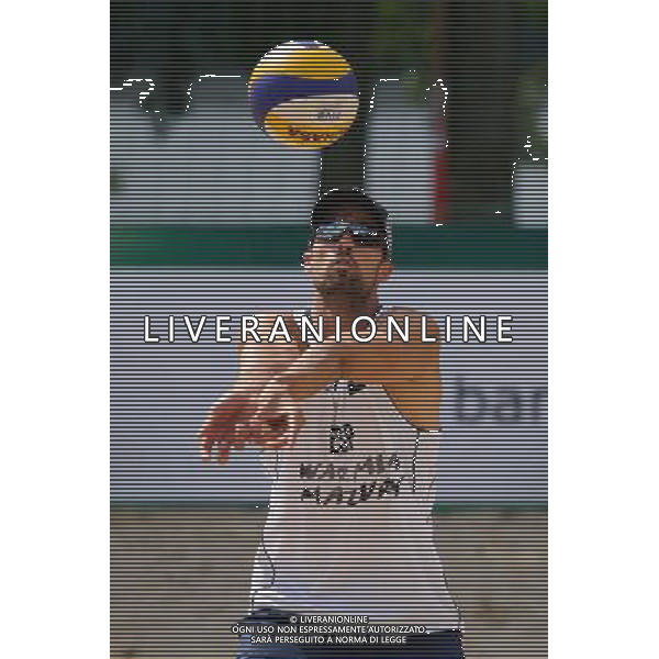 22.08.2014 - Stare Jablonki , siatkowka plazowa , beach volleyball , World Tour , FIVB Stare Jablonki Grand Slam 2014 , Hiszpania (biale) - Rosja (czerwone) , Spain (white) - Russia (red) N/Z Adrian Gavira Collado Fot. Karol Bartnik / MPAimages.com/NEWSPIX.PL --- Newspix.pl /Agenzia Aldo Liverani sas - ITALY ONLY - Spagna - Russia beach volley maschile, World Tour, FIVB Stare Jablonki Grande Slam 2014 *** Local Caption *** www.newspix.pl mail us: info@newspix.pl call us: 0048 022 23 22 222 --- Polish Picture Agency by Ringier Axel Springer Poland