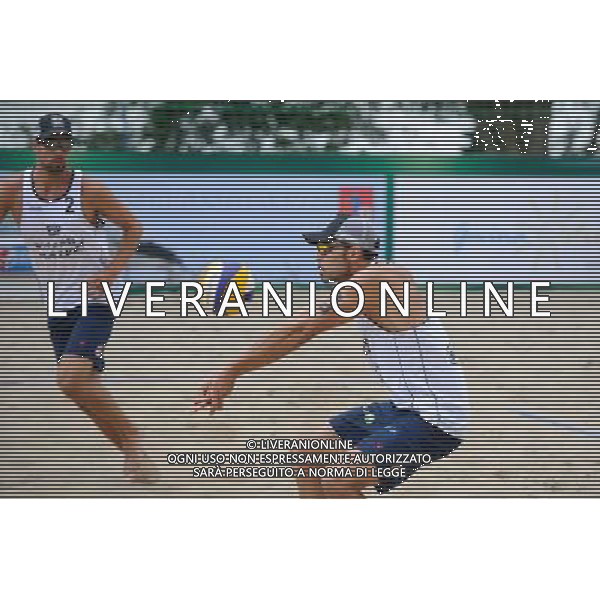 22.08.2014 - Stare Jablonki , siatkowka plazowa , beach volleyball , World Tour , FIVB Stare Jablonki Grand Slam 2014 , Hiszpania (biale) - Rosja (czerwone) , Spain (white) - Russia (red) N/Z Pablo Herrera Allepuz Fot. Karol Bartnik / MPAimages.com/NEWSPIX.PL --- Newspix.pl /Agenzia Aldo Liverani sas - ITALY ONLY - Spagna - Russia beach volley maschile, World Tour, FIVB Stare Jablonki Grande Slam 2014 *** Local Caption *** www.newspix.pl mail us: info@newspix.pl call us: 0048 022 23 22 222 --- Polish Picture Agency by Ringier Axel Springer Poland