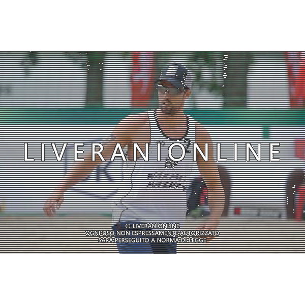 22.08.2014 - Stare Jablonki , siatkowka plazowa , beach volleyball , World Tour , FIVB Stare Jablonki Grand Slam 2014 , Hiszpania (biale) - Rosja (czerwone) , Spain (white) - Russia (red) N/Z Adrian Gavira Collado Fot. Karol Bartnik / MPAimages.com/NEWSPIX.PL --- Newspix.pl /Agenzia Aldo Liverani sas - ITALY ONLY - Spagna - Russia beach volley maschile, World Tour, FIVB Stare Jablonki Grande Slam 2014 *** Local Caption *** www.newspix.pl mail us: info@newspix.pl call us: 0048 022 23 22 222 --- Polish Picture Agency by Ringier Axel Springer Poland