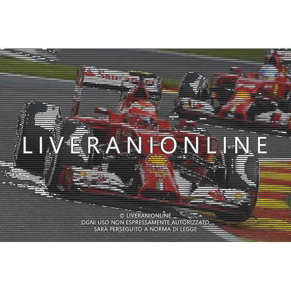 Kimi Raikkonen (FIN) Ferrari F14-T leads team mate Fernando Alonso (ESP) Ferrari F14-T. 23.08.2014. Formula 1 World Championship, Rd 12, Belgian Grand Prix, Spa Francorchamps, Belgium, Qualifying Day. AG ALDO LIVERANI SAS ONLY ITALY