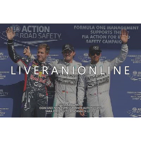 Sebastian Vettel (GER), Red Bull Racing, Nico Rosberg (GER), Mercedes AMG F1 Team and Lewis Hamilton (GBR), Mercedes AMG F1 Team 23.08.2014. Formula 1 World Championship, Rd 12, Belgian Grand Prix, Spa Francorchamps, Belgium, Qualifying Day. AG ALDO LIVERANI SAS ONLY ITALY