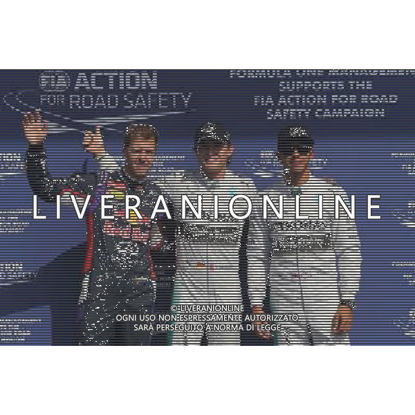 Sebastian Vettel (GER), Red Bull Racing, Nico Rosberg (GER), Mercedes AMG F1 Team and Lewis Hamilton (GBR), Mercedes AMG F1 Team 23.08.2014. Formula 1 World Championship, Rd 12, Belgian Grand Prix, Spa Francorchamps, Belgium, Qualifying Day. AG ALDO LIVERANI SAS ONLY ITALY