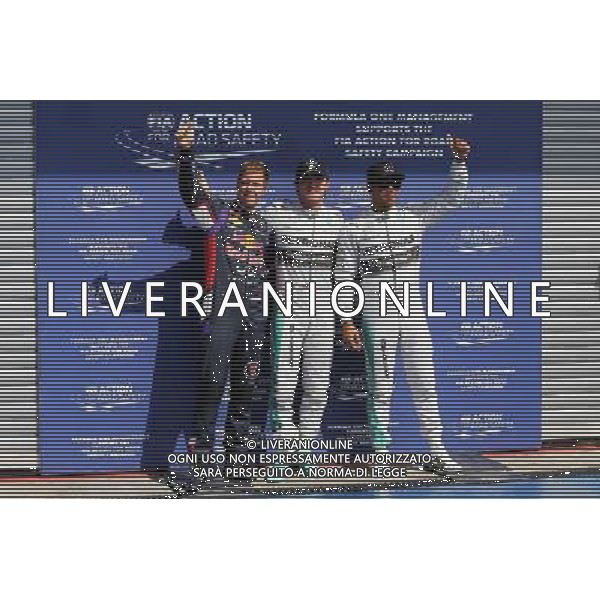 Qualifying top three in parc ferme (L to R): Sebastian Vettel (GER) Red Bull Racing, third; Nico Rosberg (GER) Mercedes AMG F1, pole position; Lewis Hamilton (GBR) Mercedes AMG F1, second. 23.08.2014. Formula 1 World Championship, Rd 12, Belgian Grand Prix, Spa Francorchamps, Belgium, Qualifying Day. AG ALDO LIVERANI SAS ONLY ITALY