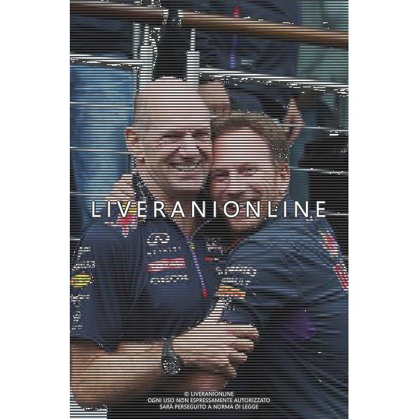 (L to R): Adrian Newey (GBR) Red Bull Racing Chief Technical Officer and Christian Horner (GBR) Red Bull Racing Team Principal take part in the ALS ice bucket challenge. 23.08.2014. Formula 1 World Championship, Rd 12, Belgian Grand Prix, Spa Francorchamps, Belgium, Qualifying Day. AG ALDO LIVERANI SAS ONLY ITALY