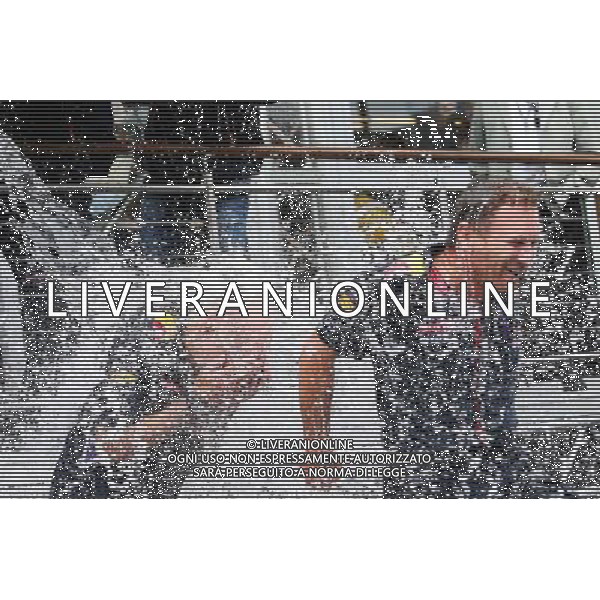 (L to R): Adrian Newey (GBR) Red Bull Racing Chief Technical Officer and Christian Horner (GBR) Red Bull Racing Team Principal take part in the ALS ice bucket challenge. 23.08.2014. Formula 1 World Championship, Rd 12, Belgian Grand Prix, Spa Francorchamps, Belgium, Qualifying Day. AG ALDO LIVERANI SAS ONLY ITALY