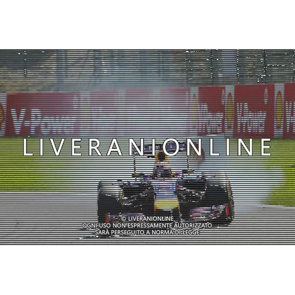 Daniel Ricciardo (AUS) Red Bull Racing RB10 locks up under braking. 24.08.2014. Formula 1 World Championship, Rd 12, Belgian Grand Prix, Spa Francorchamps, Belgium, Race Day. AG ALDO LIVERANI SAS ONLY ITALY
