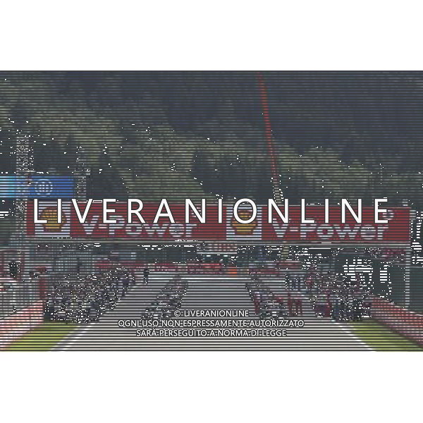 Ferrari mechanics on the grid working on the Ferrari F14-T of Fernando Alonso (ESP) Ferrari. 24.08.2014. Formula 1 World Championship, Rd 12, Belgian Grand Prix, Spa Francorchamps, Belgium, Race Day. AG ALDO LIVERANI SAS ONLY ITALY