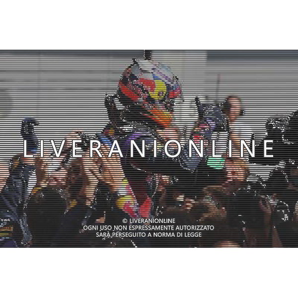 Race winner Daniel Ricciardo (AUS) Red Bull Racing celebrates in parc ferme. 24.08.2014. Formula 1 World Championship, Rd 12, Belgian Grand Prix, Spa Francorchamps, Belgium, Race Day. AG ALDO LIVERANI SAS ONLY ITALY