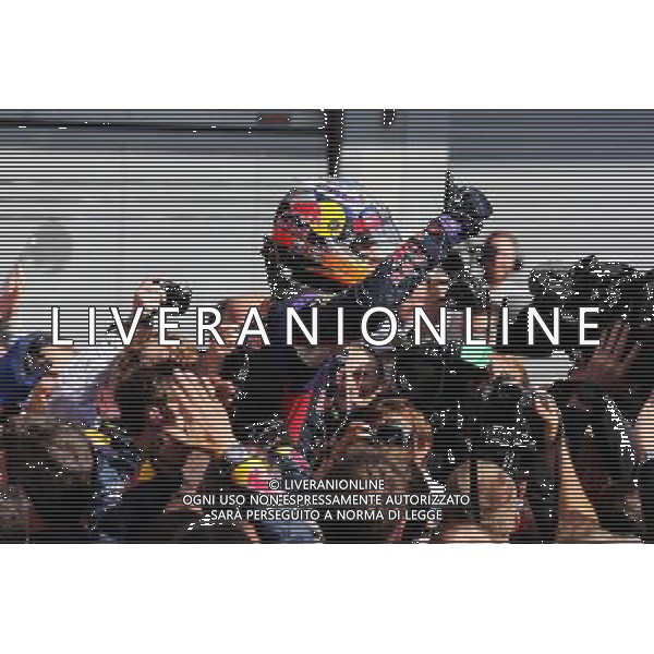 Race winner Daniel Ricciardo (AUS) Red Bull Racing celebrates in parc ferme. 24.08.2014. Formula 1 World Championship, Rd 12, Belgian Grand Prix, Spa Francorchamps, Belgium, Race Day. AG ALDO LIVERANI SAS ONLY ITALY