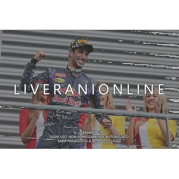 Race winner Daniel Ricciardo (AUS) Red Bull Racing celebrates on the podium. 24.08.2014. Formula 1 World Championship, Rd 12, Belgian Grand Prix, Spa Francorchamps, Belgium, Race Day. AG ALDO LIVERANI SAS ONLY ITALY