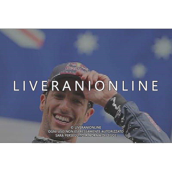 Race winner Daniel Ricciardo (AUS) Red Bull Racing celebrates on the podium. 24.08.2014. Formula 1 World Championship, Rd 12, Belgian Grand Prix, Spa Francorchamps, Belgium, Race Day. AG ALDO LIVERANI SAS ONLY ITALY