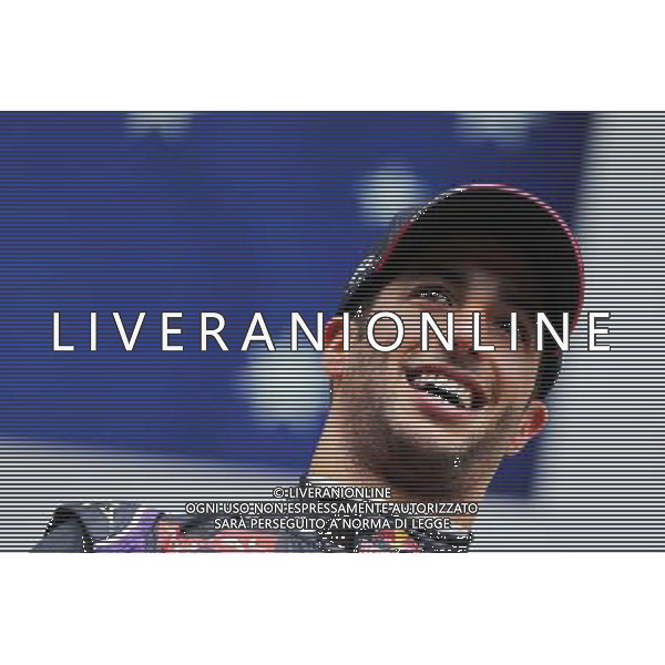 Race winner Daniel Ricciardo (AUS) Red Bull Racing celebrates on the podium. 24.08.2014. Formula 1 World Championship, Rd 12, Belgian Grand Prix, Spa Francorchamps, Belgium, Race Day. AG ALDO LIVERANI SAS ONLY ITALY