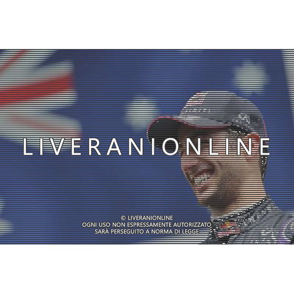 Race winner Daniel Ricciardo (AUS) Red Bull Racing celebrates on the podium. 24.08.2014. Formula 1 World Championship, Rd 12, Belgian Grand Prix, Spa Francorchamps, Belgium, Race Day. AG ALDO LIVERANI SAS ONLY ITALY
