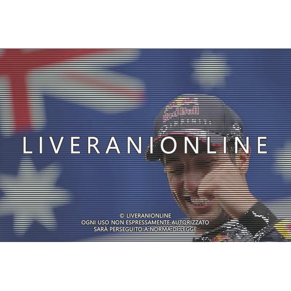 Race winner Daniel Ricciardo (AUS) Red Bull Racing celebrates on the podium. 24.08.2014. Formula 1 World Championship, Rd 12, Belgian Grand Prix, Spa Francorchamps, Belgium, Race Day. AG ALDO LIVERANI SAS ONLY ITALY