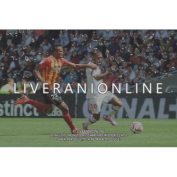 Jean Philippe GBAMIN / Alexandre LACAZETTE - 24.08.2014 - Lyon / Lens - 3e journee Ligue 1 Photo : Jean Paul Thomas / Icon Sport AG ALDO LIVERANI SAS ONLY ITALY
