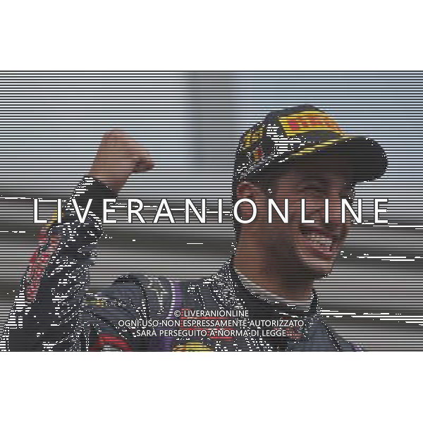 Race winner Daniel Ricciardo (AUS) Red Bull Racing celebrates on the podium. 24.08.2014. Formula 1 World Championship, Rd 12, Belgian Grand Prix, Spa Francorchamps, Belgium, Race Day. AG ALDO LIVERANI SAS ONLY ITALY