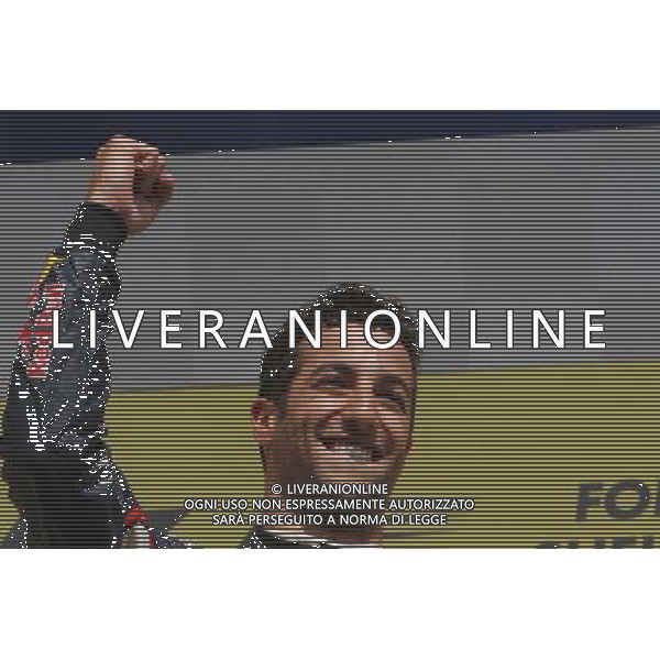 Race winner Daniel Ricciardo (AUS) Red Bull Racing celebrates on the podium. 24.08.2014. Formula 1 World Championship, Rd 12, Belgian Grand Prix, Spa Francorchamps, Belgium, Race Day. AG ALDO LIVERANI SAS ONLY ITALY